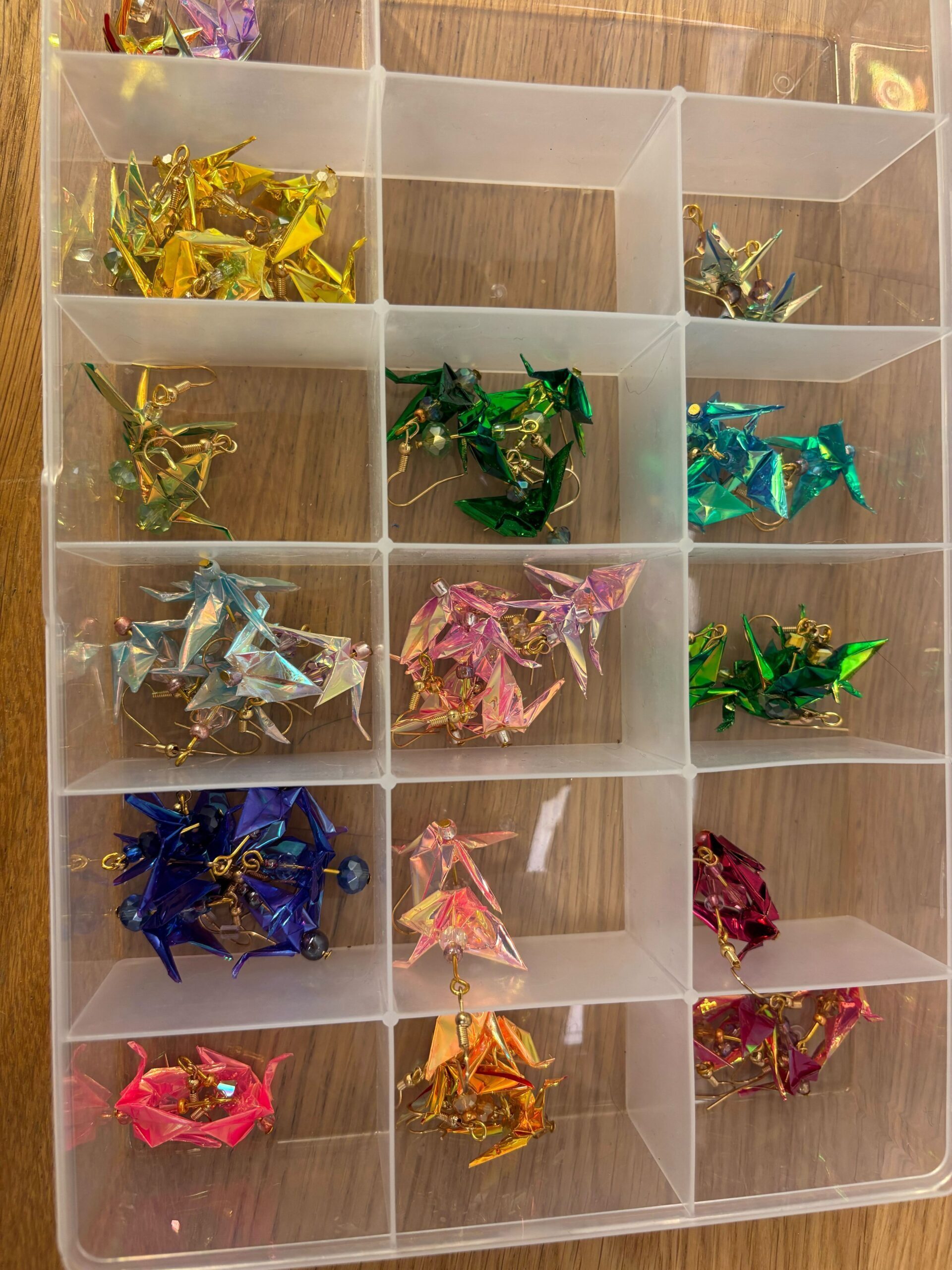 Boucles d'oreiles oiseau papier IRIDESCENT UNI (65$)