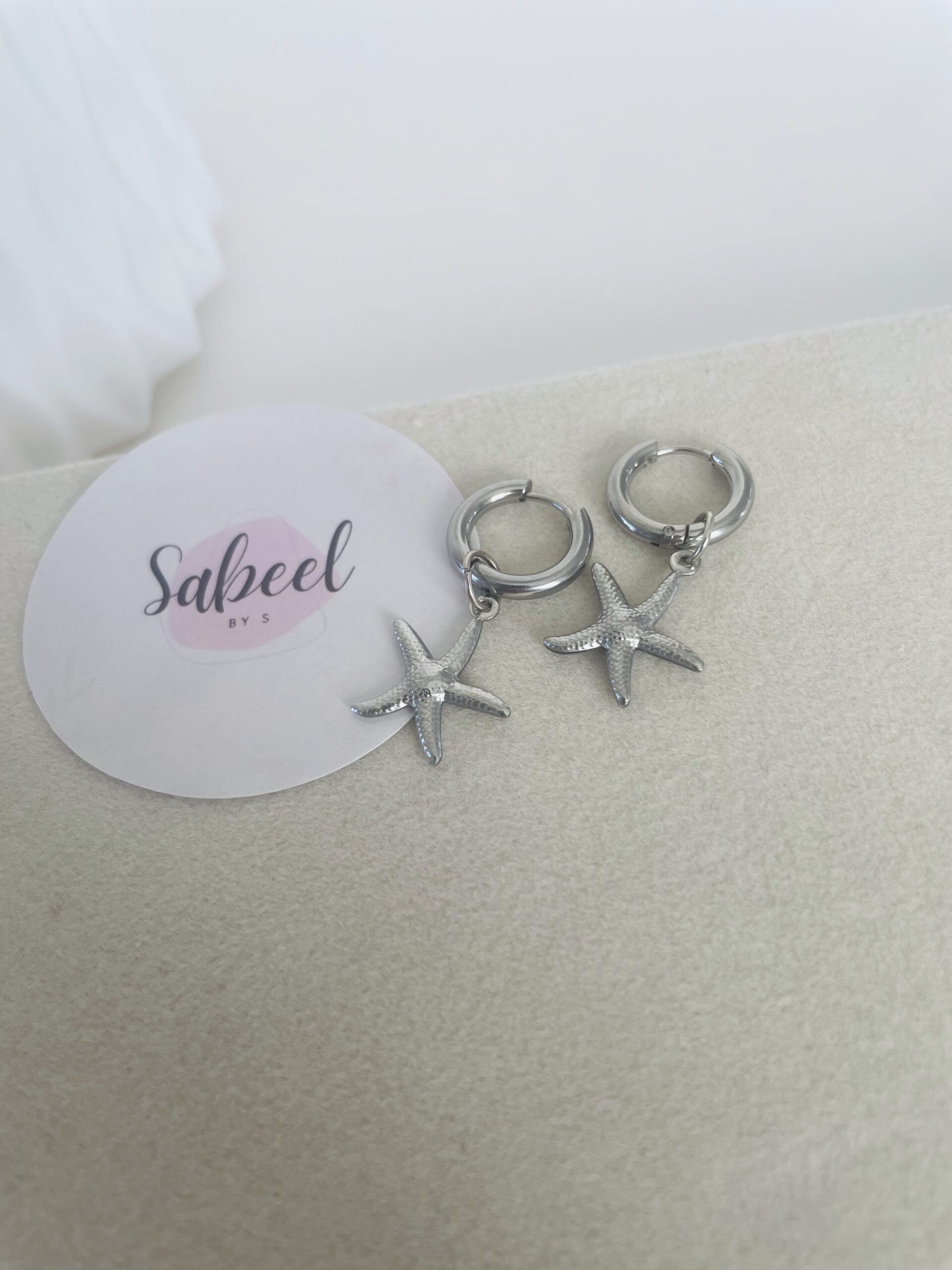 Boucles d'oreilles étoile de mer argenté