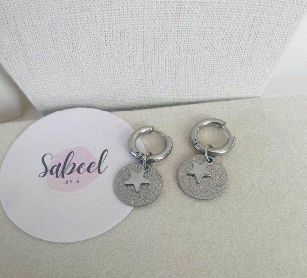 Boucles d'oreilles étoile pailleté argenté